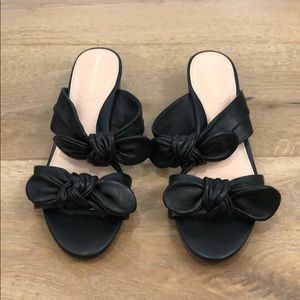 Taryn Rose black leather sliders